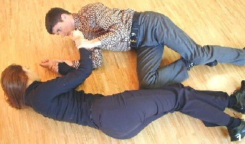 Wing Tsun Exercise 110, Fig 1 - Oponent holds defender by the arms